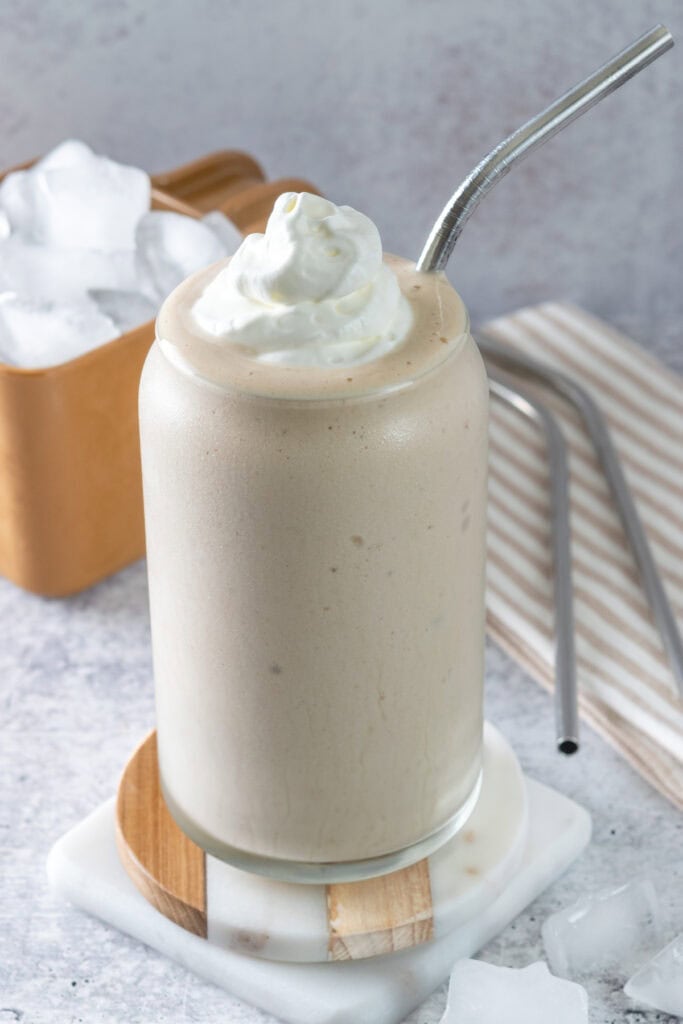 Homemade frozen coffee drink topped with whipped cream.